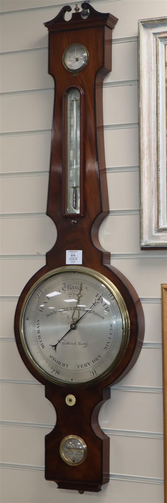 C.Heseltine, Bedford Row. A Regency mahogany wheel barometer 44in.